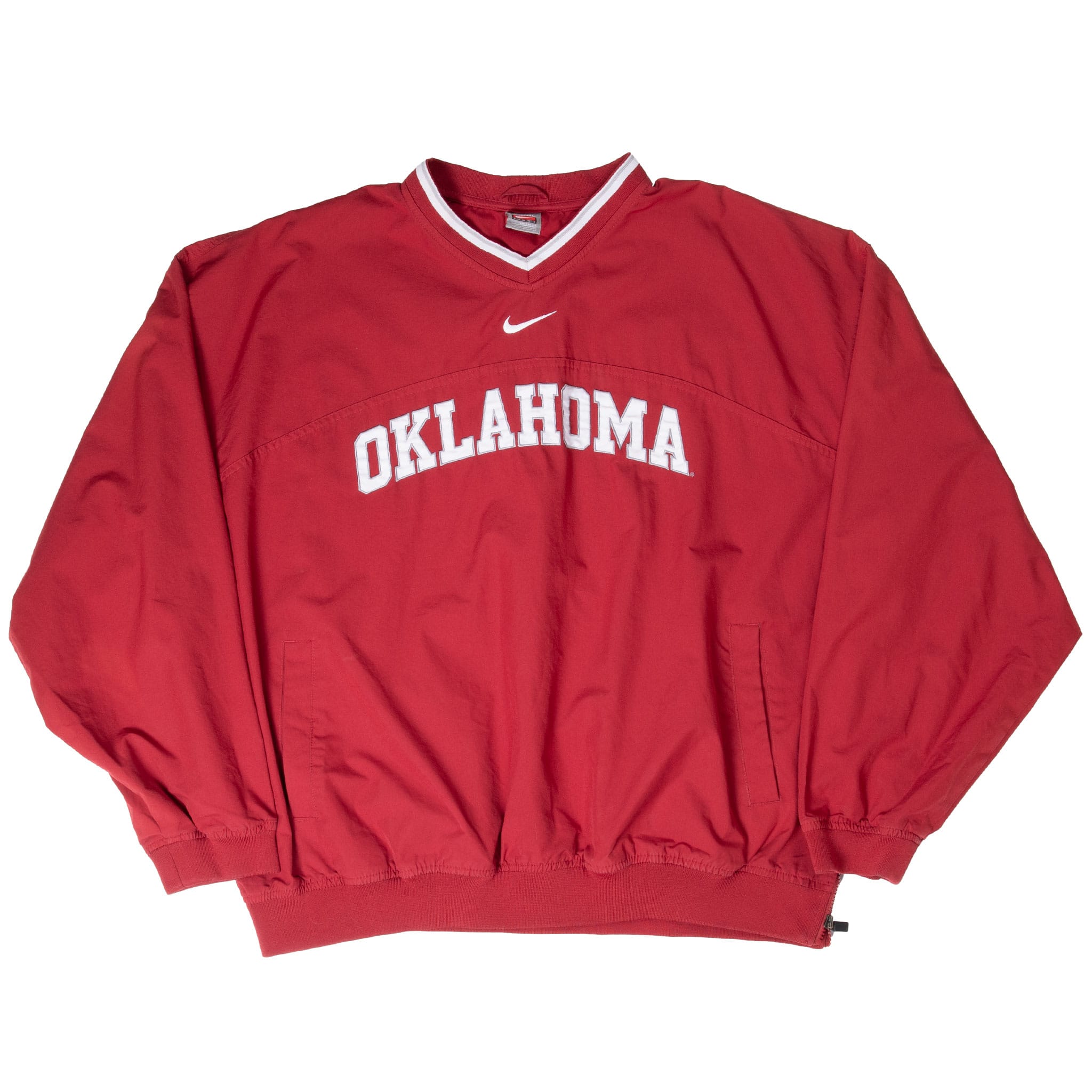 Full front view of red Nike Oklahoma pullover jacket with V-neck and welt pockets