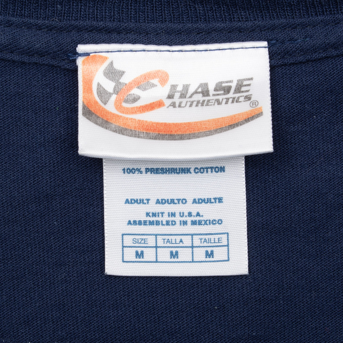 Chase Authentics neck label and medium size tag on navy tee