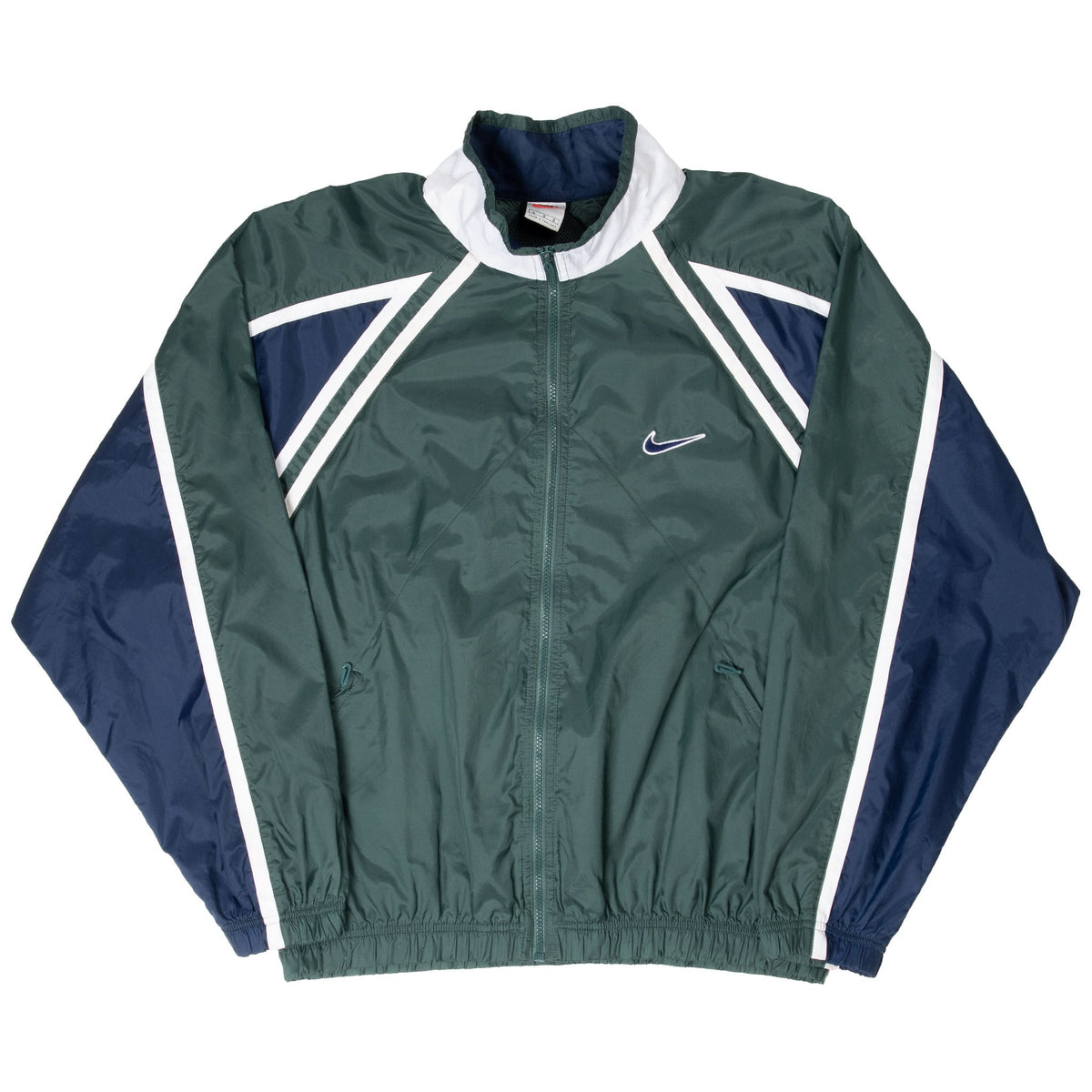 Full front view of green Nike windbreaker with navy sleeves, white trim, and zippered pockets