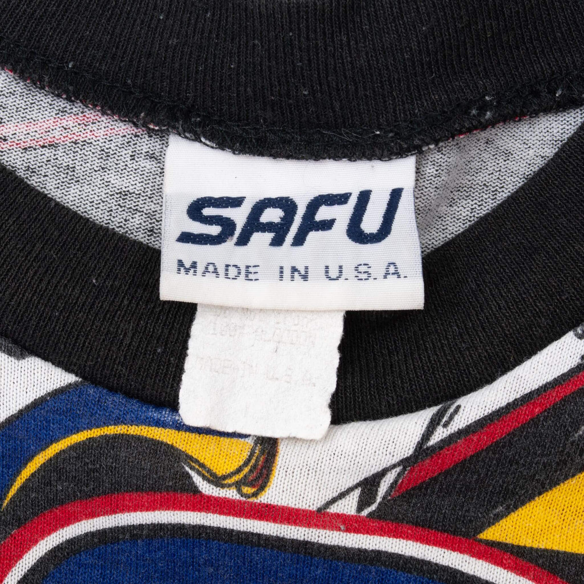 SAFU Made in U.S.A. neck label and black ribbed collar on Gulf Racing tee