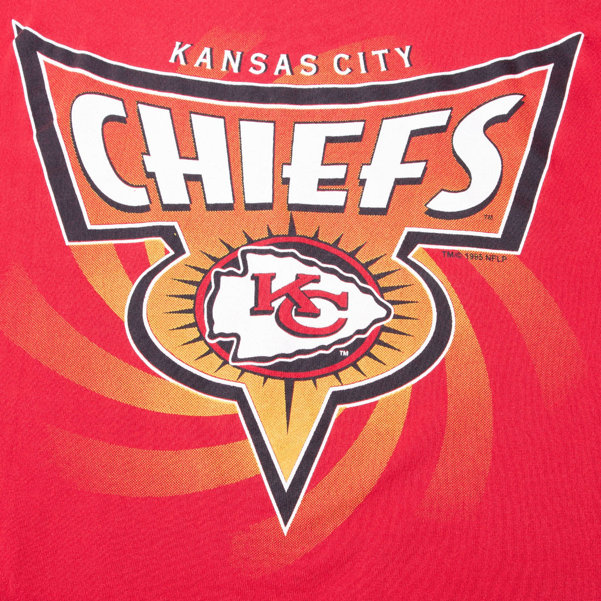 Close-up of Kansas City Chiefs lettering and arrowhead logo front graphic