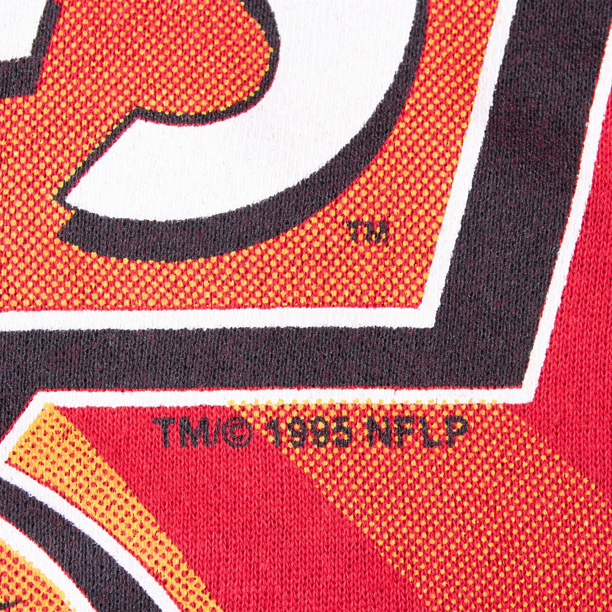 Close-up of TM © 1995 NFLP copyright mark on Chiefs graphic
