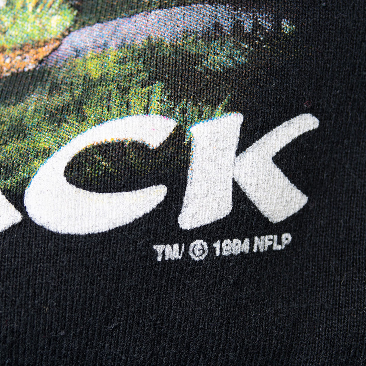 Close-up of Sack Attack print showing 1994 NFLP copyright mark