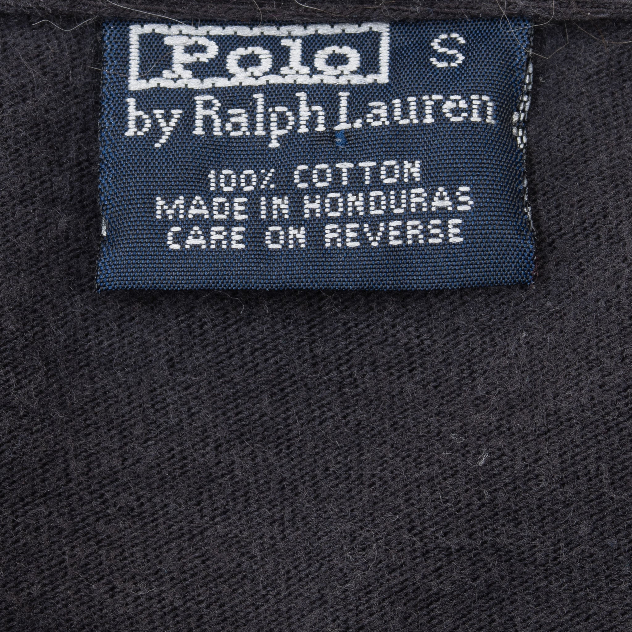 Polo by Ralph Lauren neck label marked size small, 100% cotton and made in Honduras