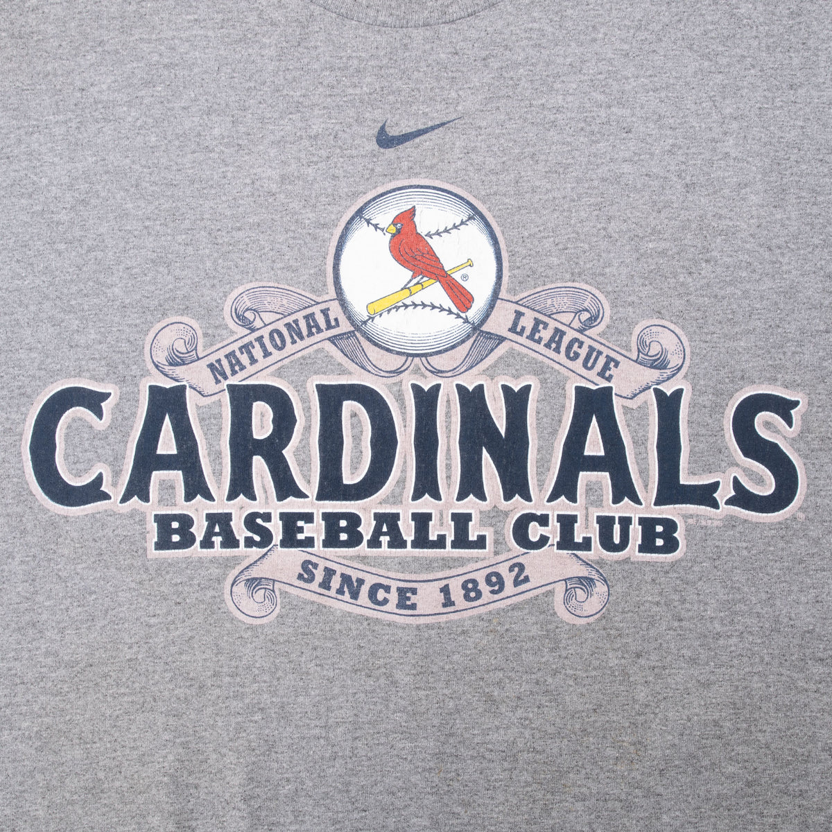 Close-up of Nike Swoosh and St. Louis Cardinals Baseball Club front graphic