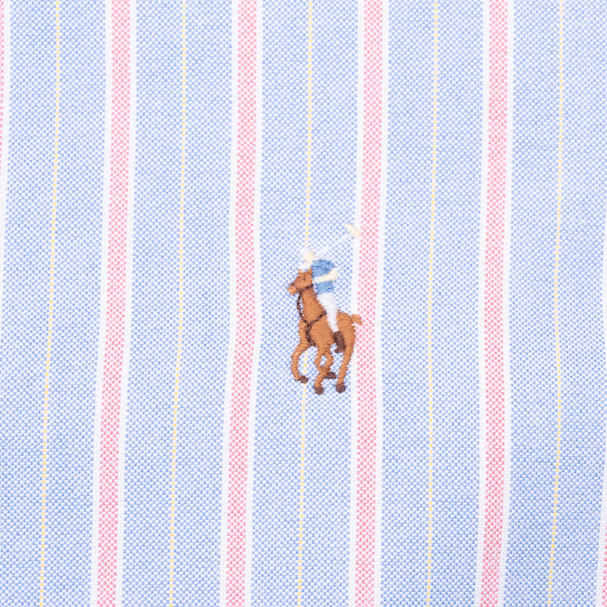 Multicolor embroidered Polo pony on blue, pink, white and yellow striped fabric
