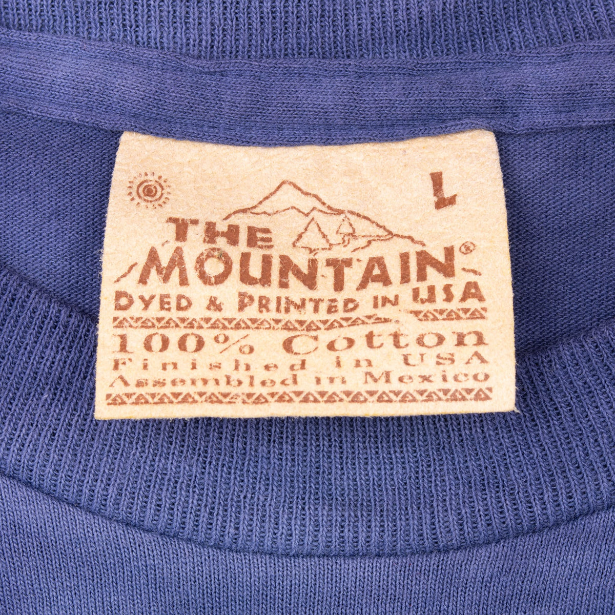 The Mountain neck label marked size large