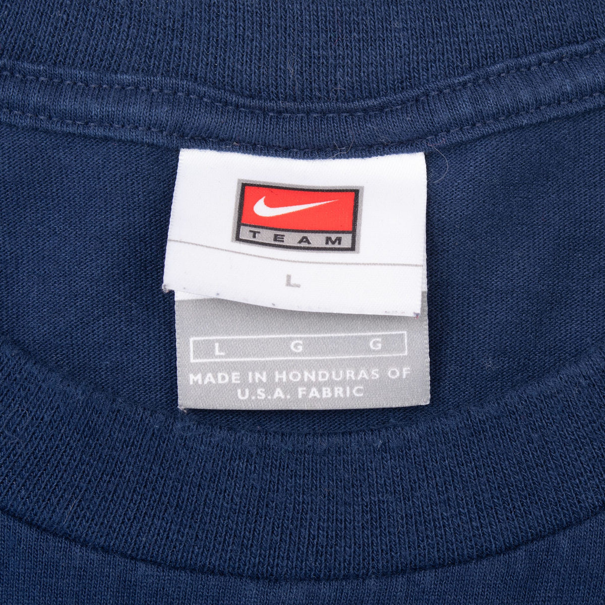 Nike Team neck tag marked size large on navy Yankees T-shirt