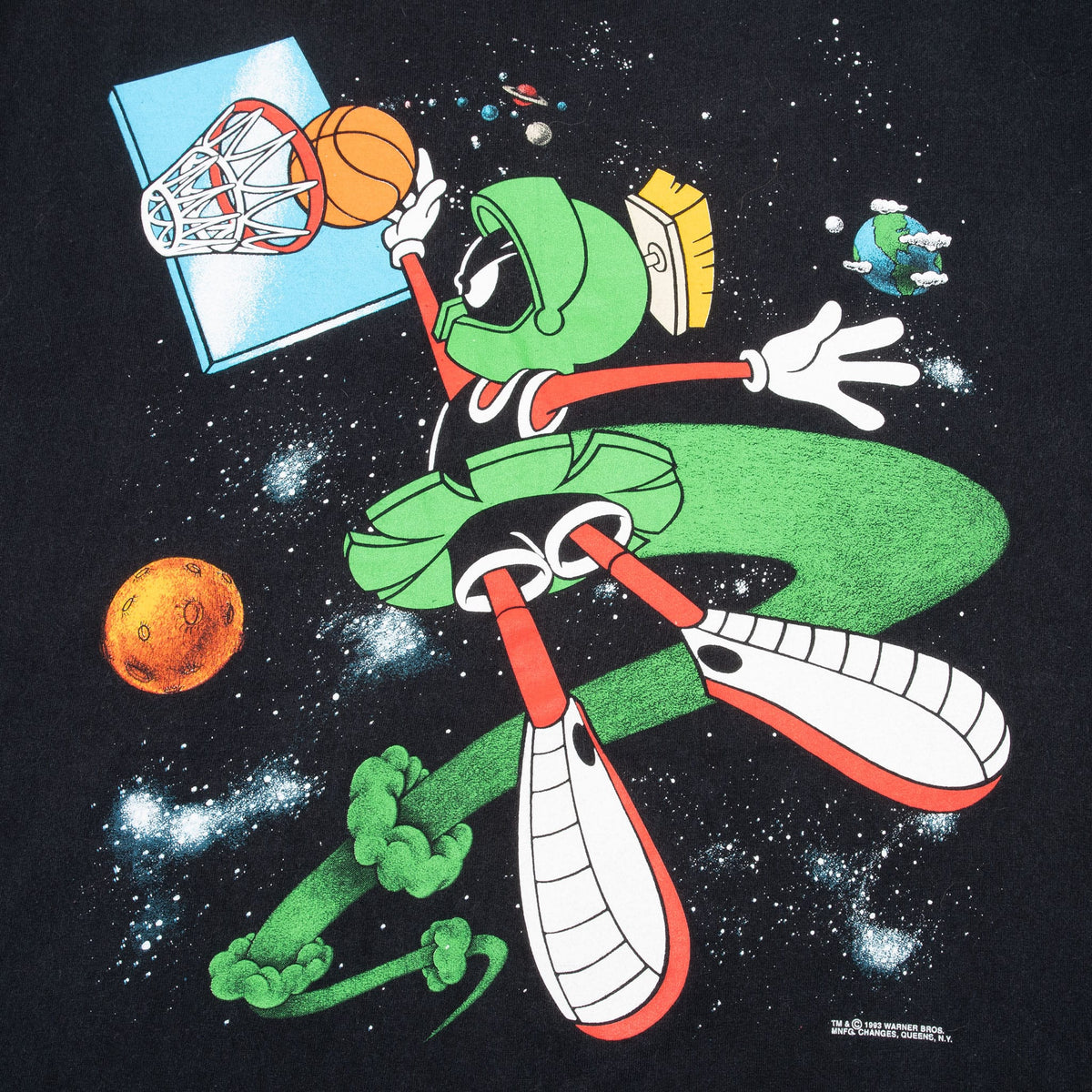 Close-up of Marvin the Martian dunking a basketball among planets and stars