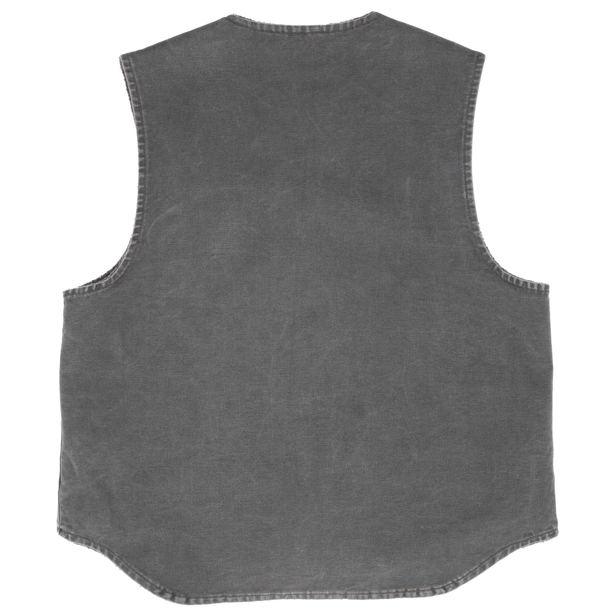 Back of dark green Carhartt vest with a curved drop-tail hem