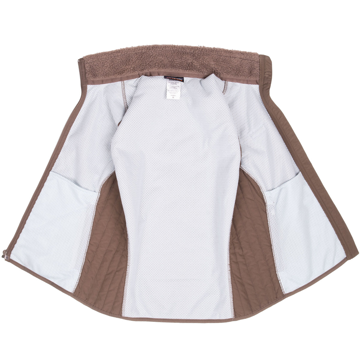 Open Patagonia Retro-X vest showing white mesh interior lining