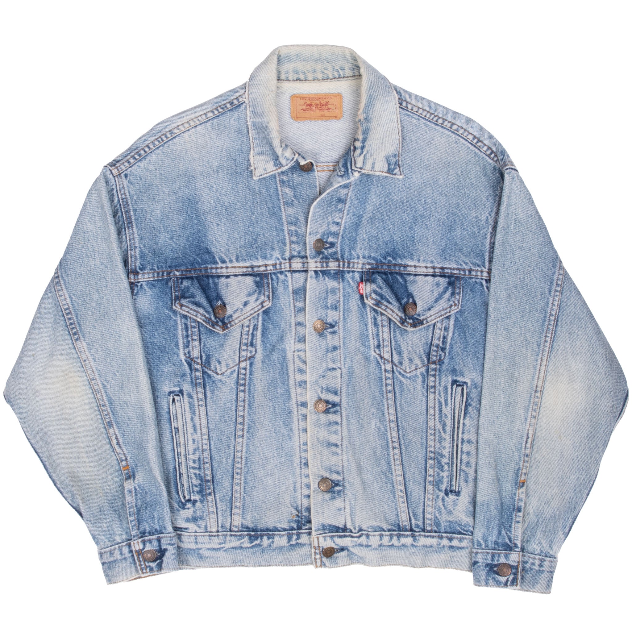 Full front of faded indigo Levi's Type III denim jacket with four pockets