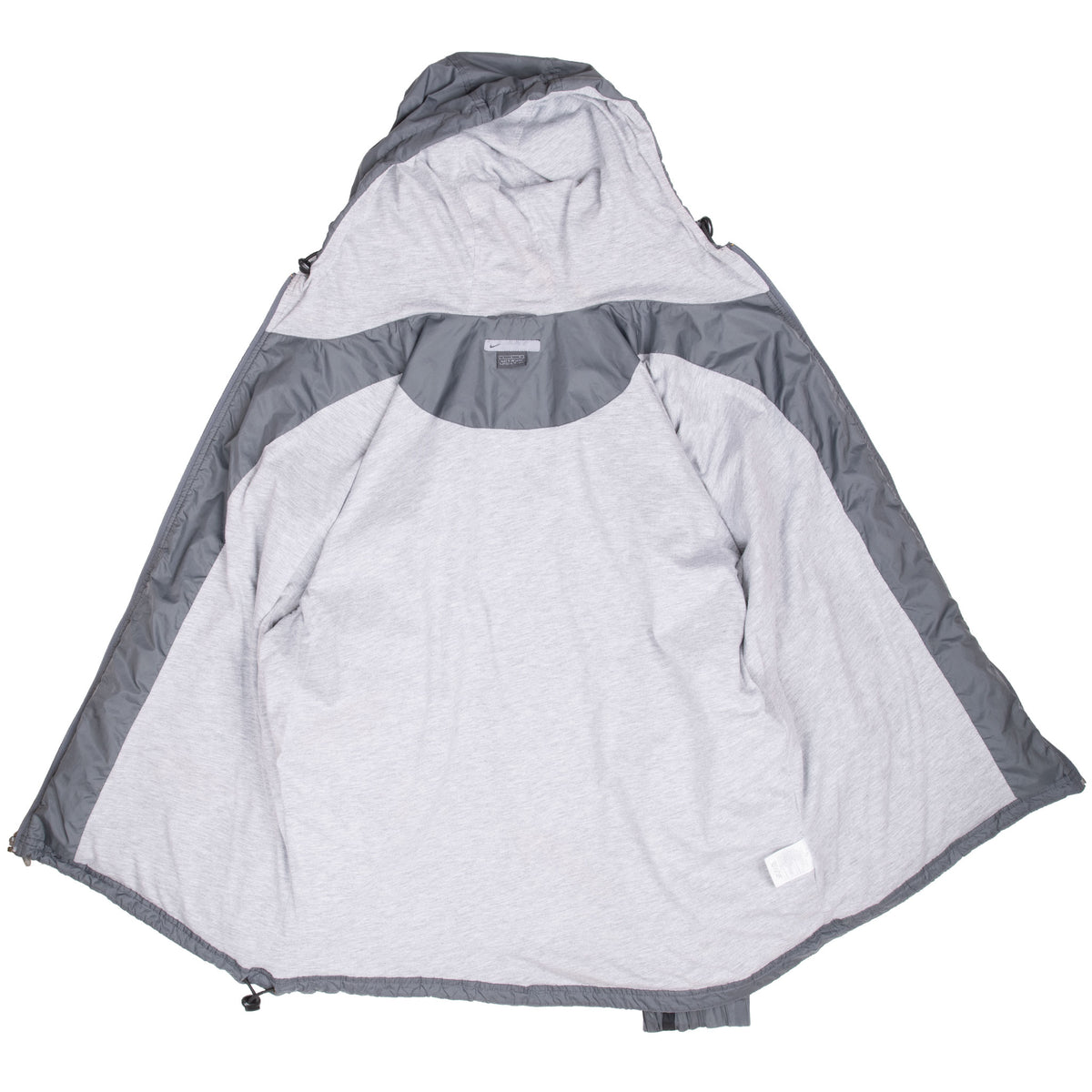 Open grey Nike hooded windbreaker showing light grey interior lining
