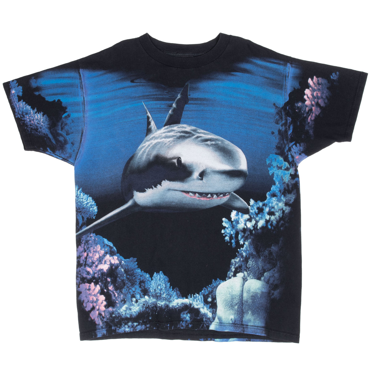 Front of black T-shirt with large shark and blue coral reef all-over print