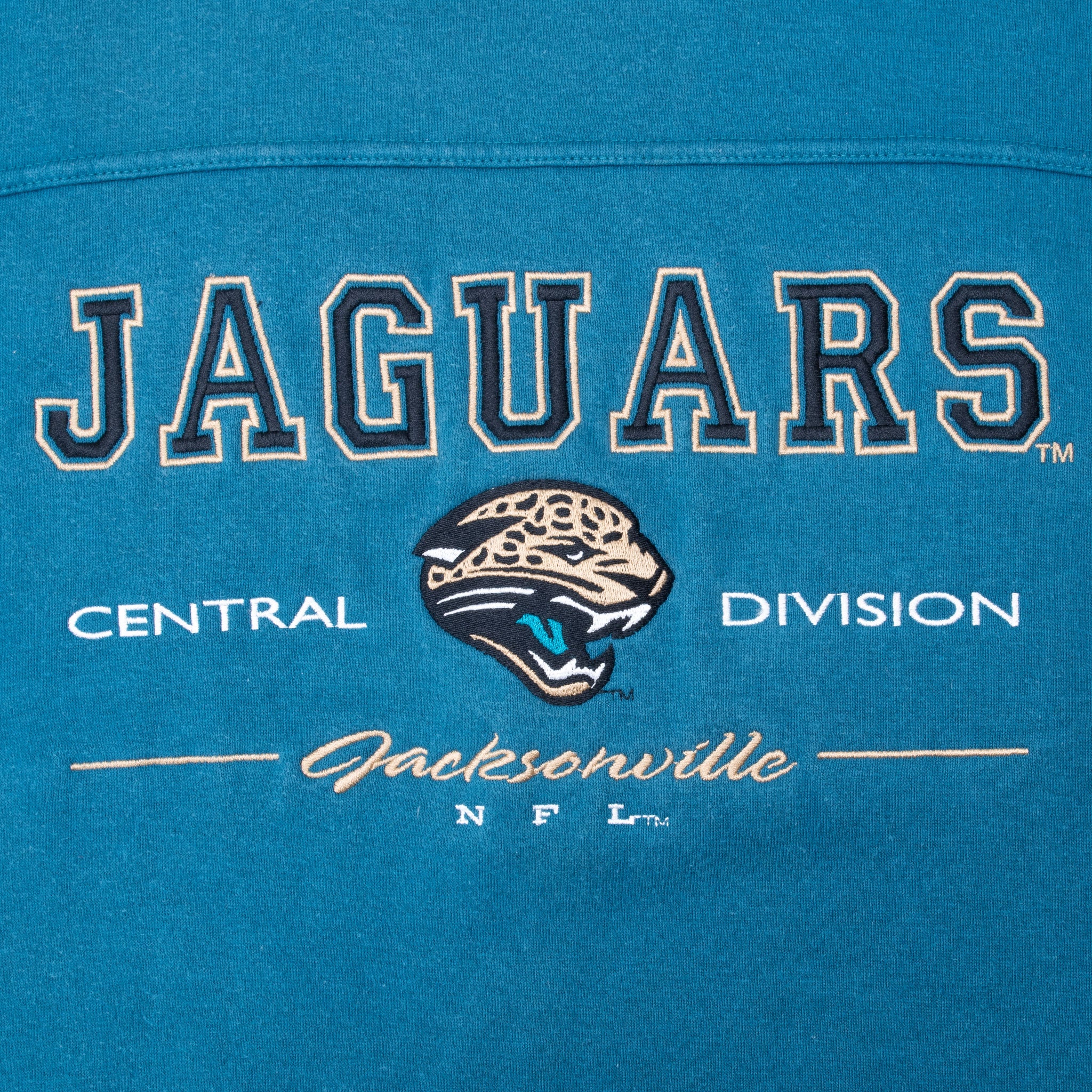 Close-up of Jacksonville Jaguars logo and Central Division chest embroidery