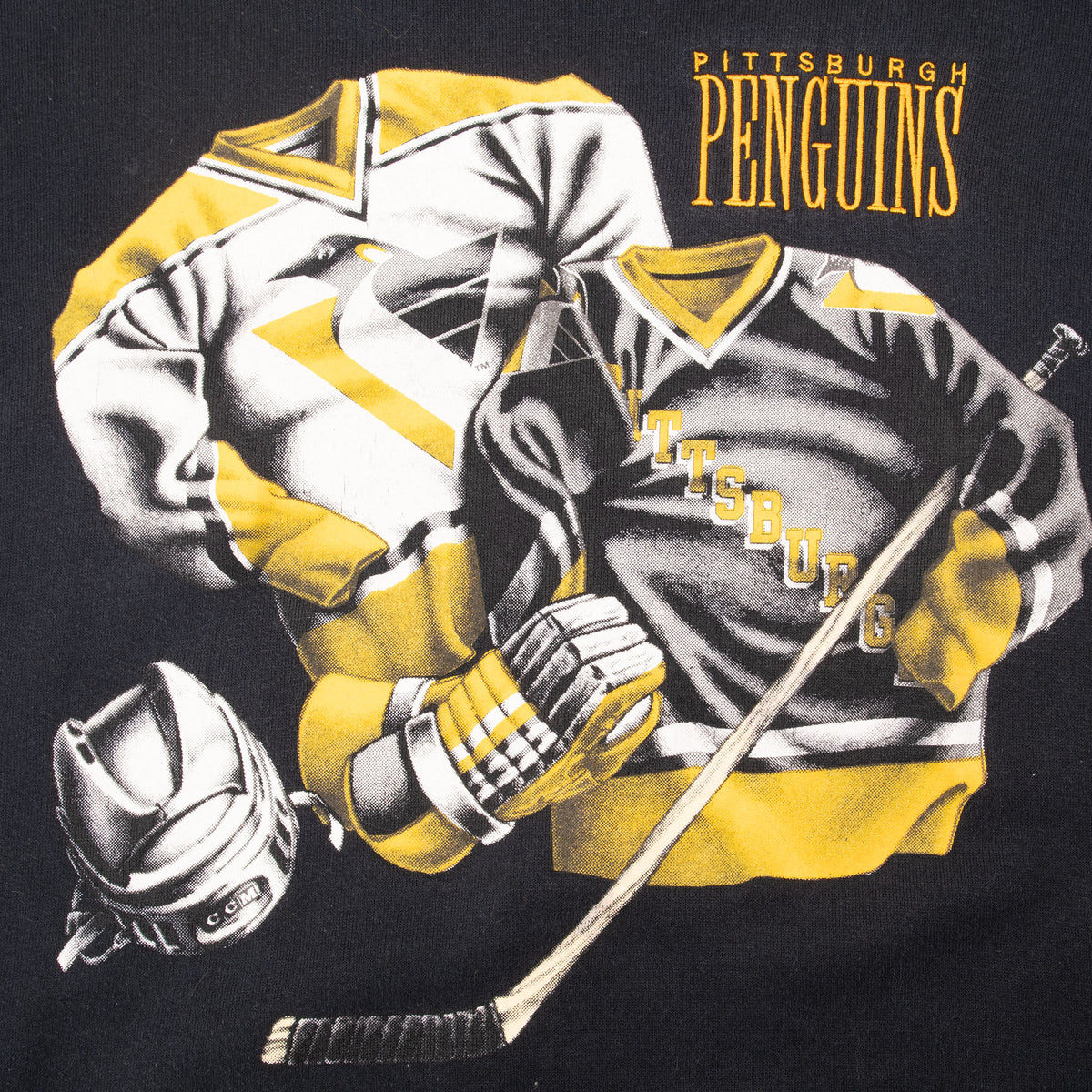 Close-up of Pittsburgh Penguins hockey player graphic in yellow, white and gray