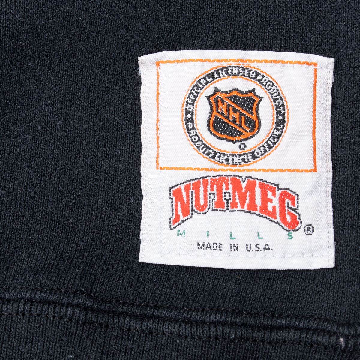 NHL licensed product and Nutmeg Mills Made in USA label detail
