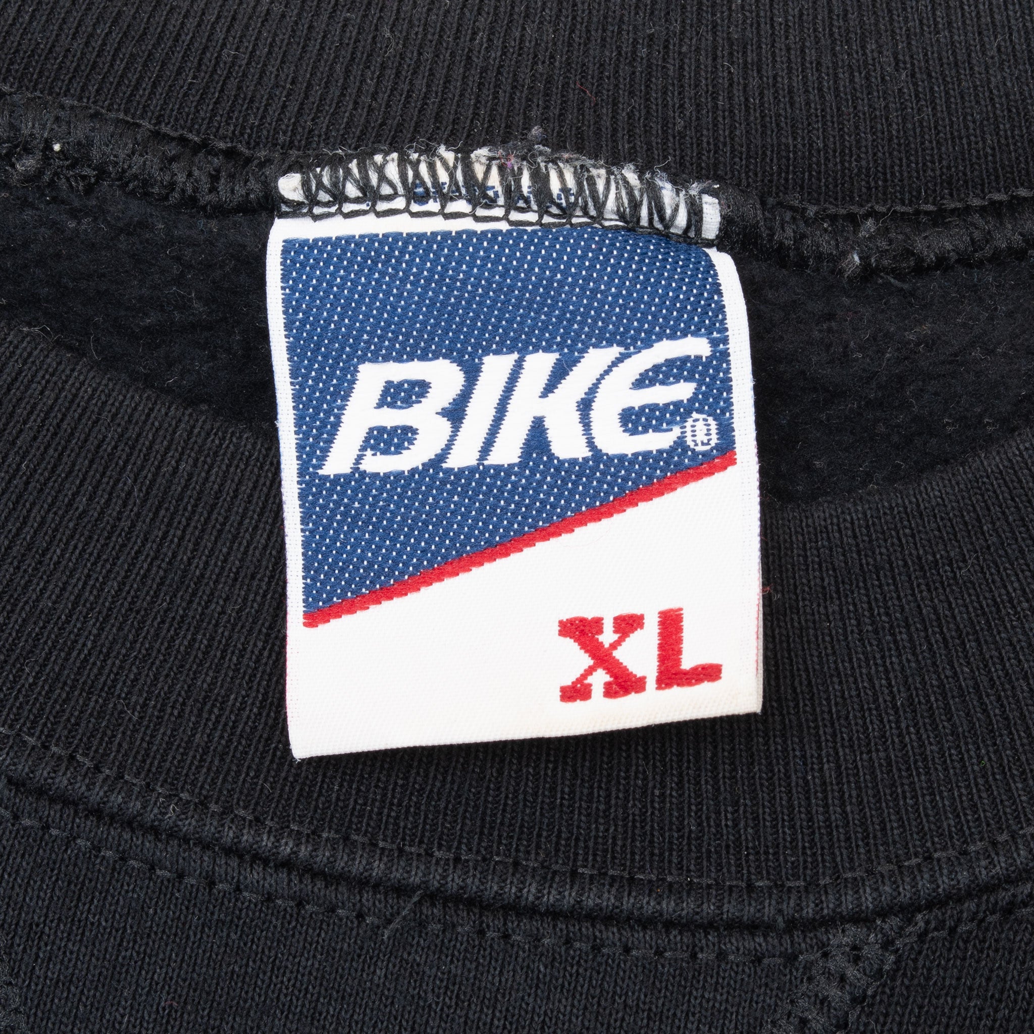 Bike XL neck tag inside black Carolina Panthers sweatshirt