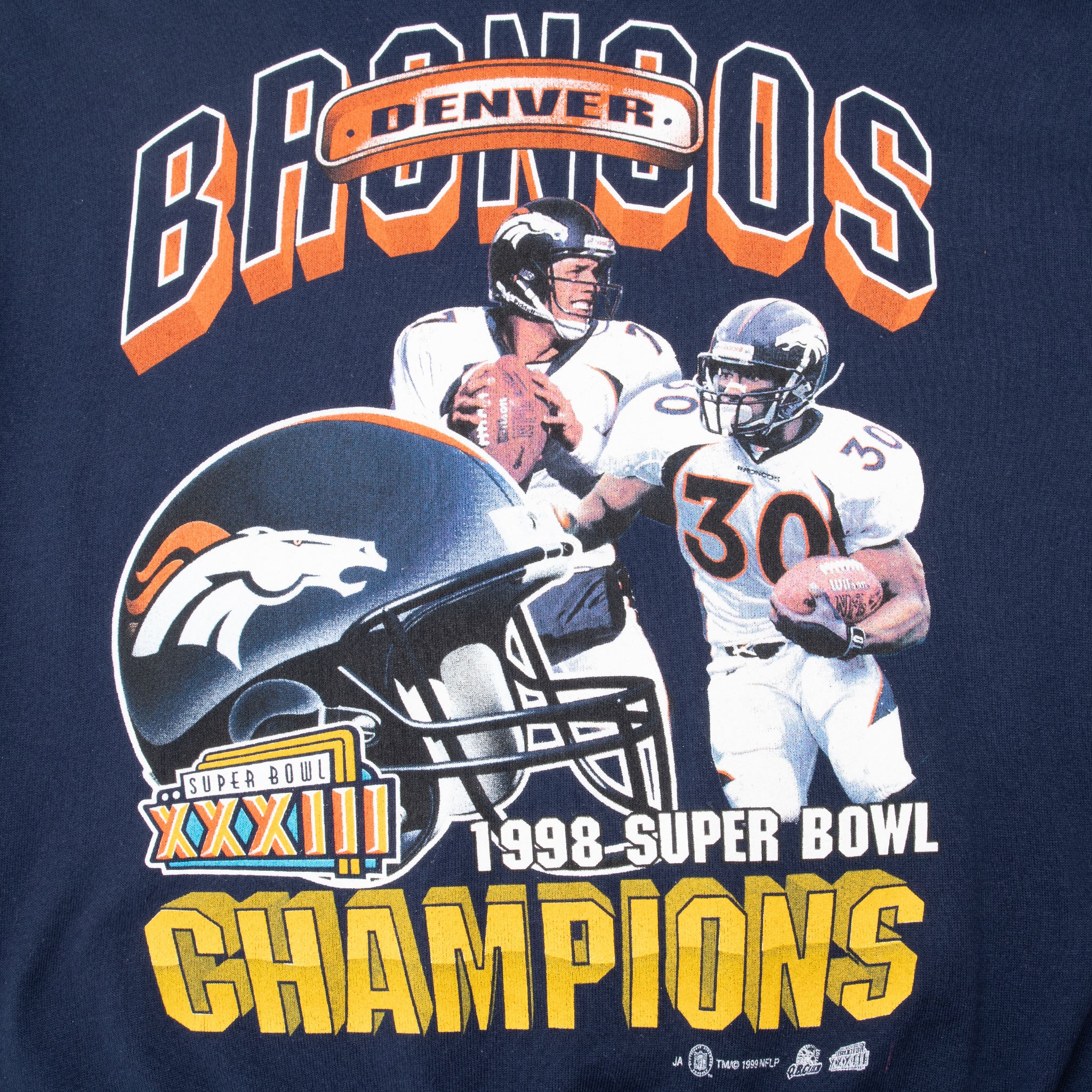 Close-up of Denver Broncos 1998 Super Bowl XXXIII champions graphic with players and helmet