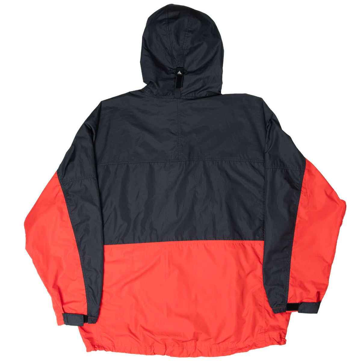 Back of black and red color-blocked Nike ACG hooded windbreaker