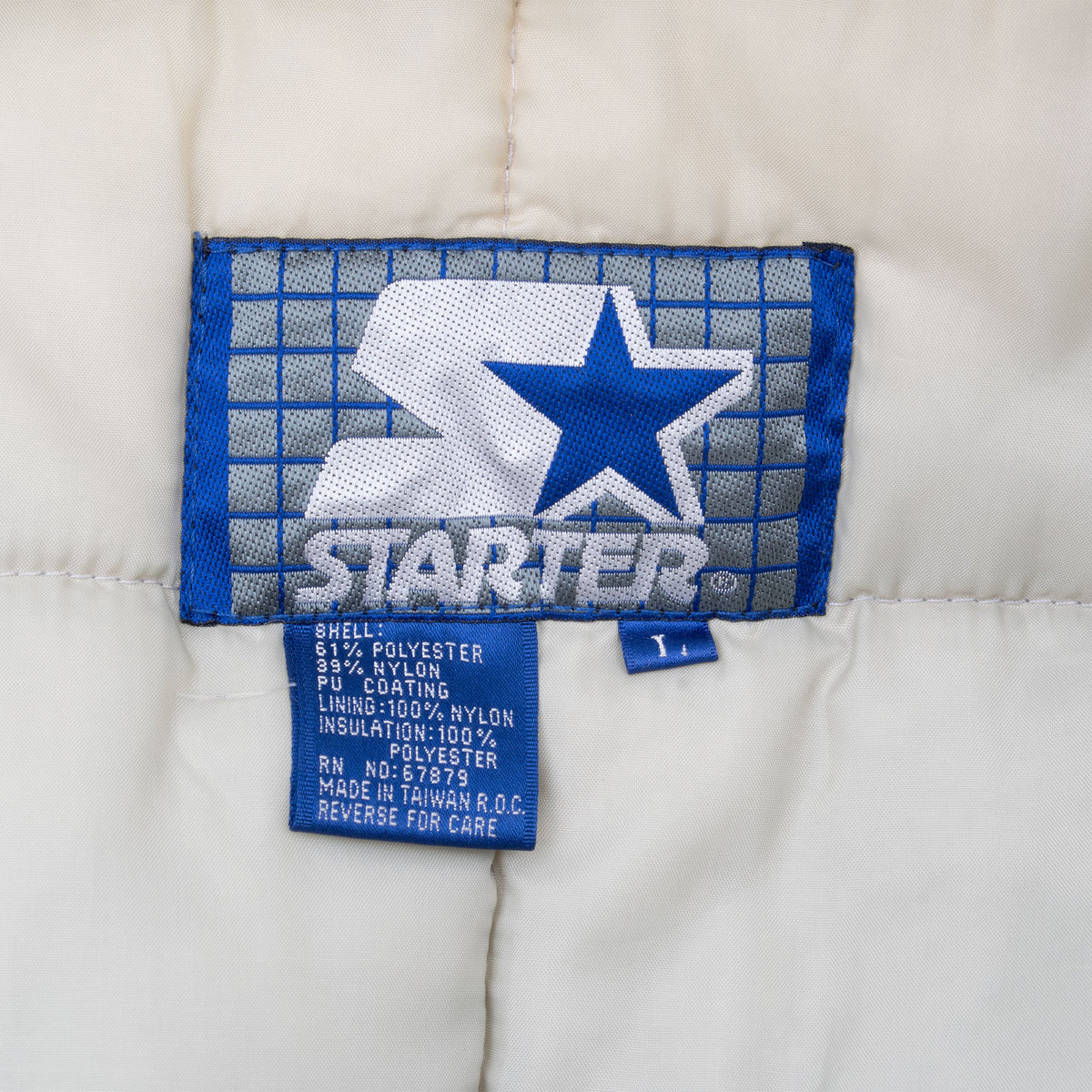 Starter neck label and care tag inside Los Angeles Raiders jacket