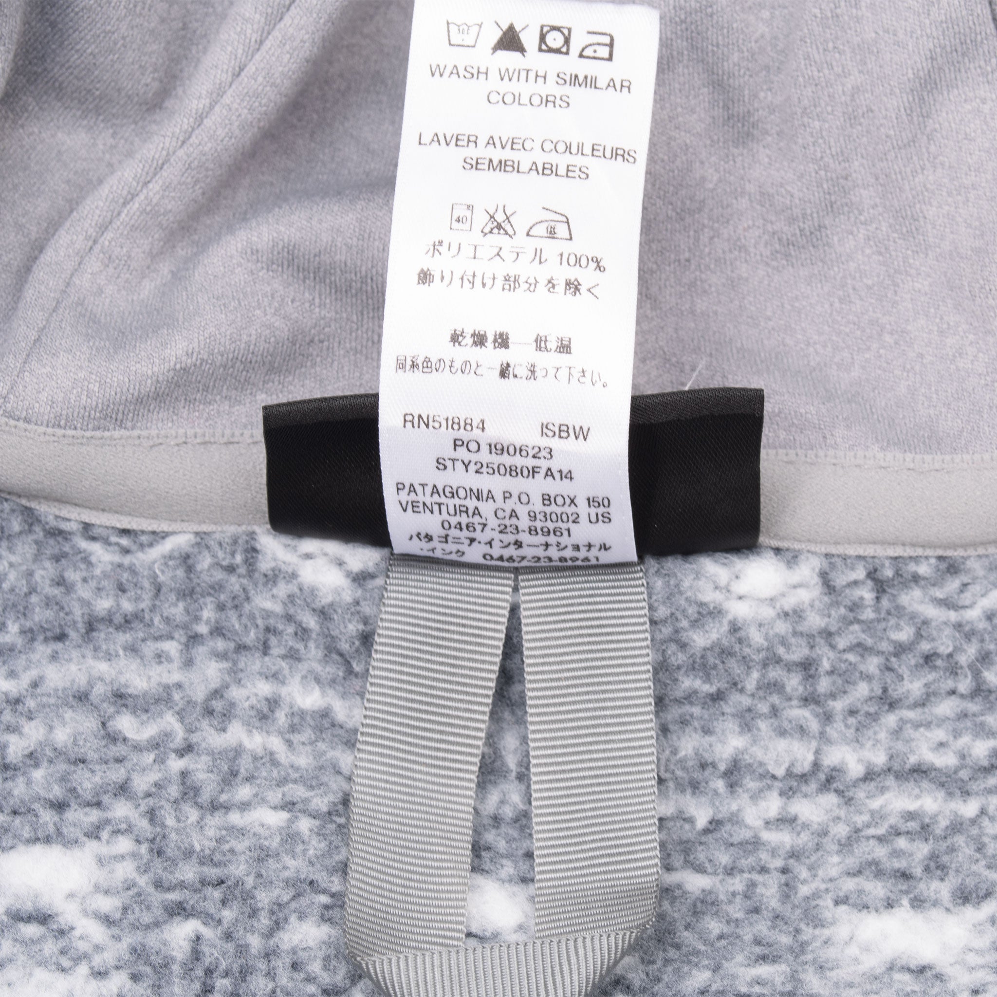 Care label inside Patagonia grey Better Sweater coat showing style 25080FA14