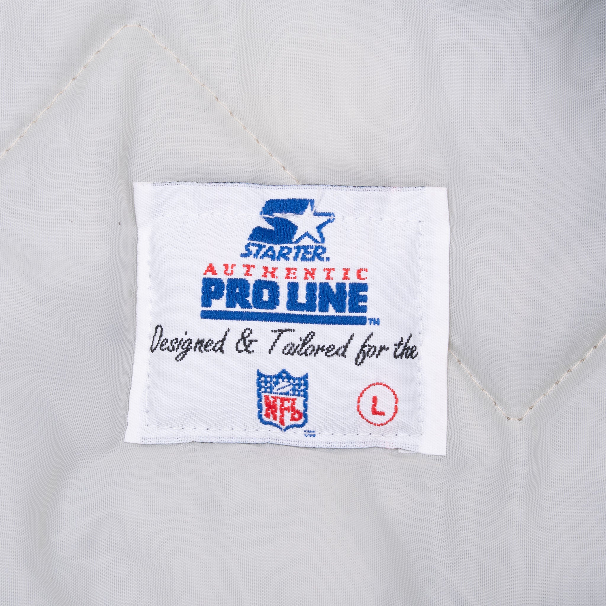 Starter Pro Line NFL neck label with size L marking