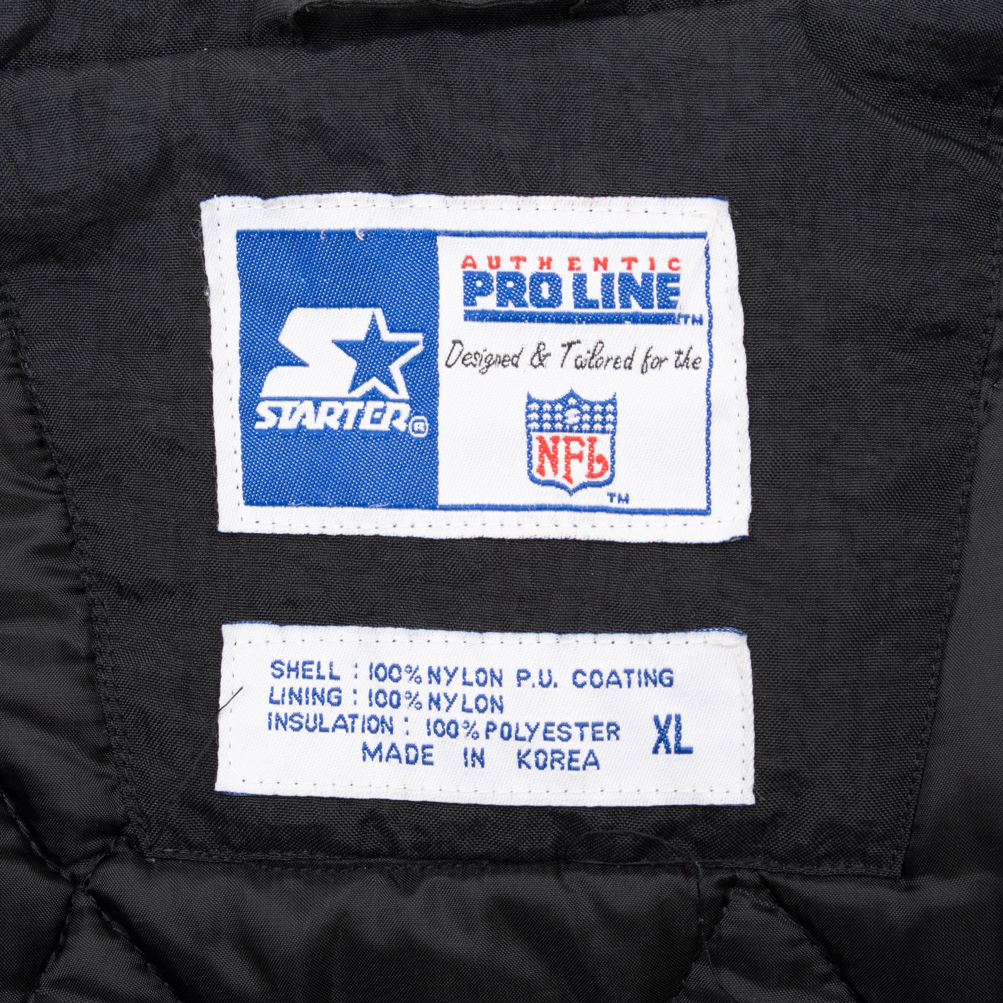 Starter NFL Pro Line and XL garment labels inside Pittsburgh Steelers jacket