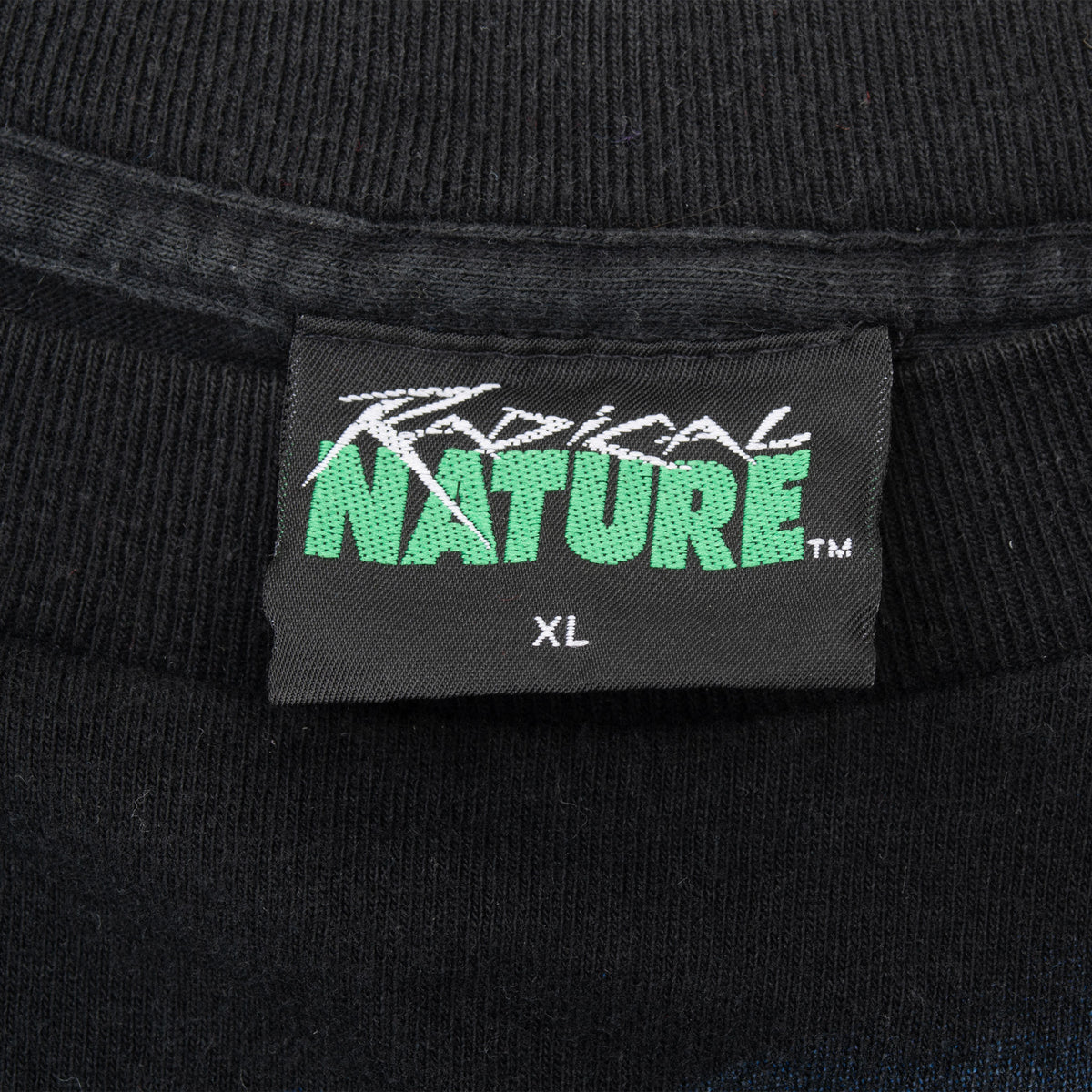 Tropical Nature XL neck tag on black T-shirt