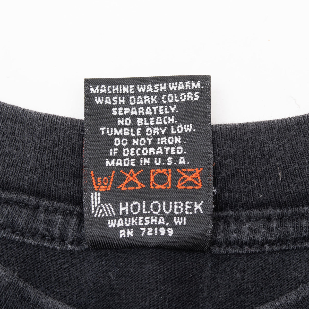 Care label showing washing instructions and Made in U.S.A. text