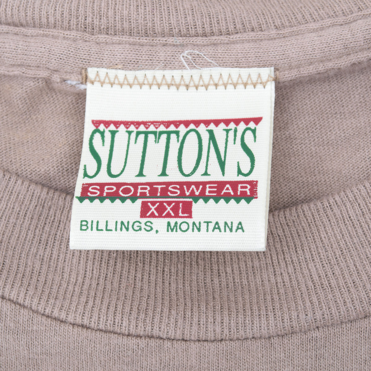 Sutton's Sportswear XXL neck tag on taupe T-shirt