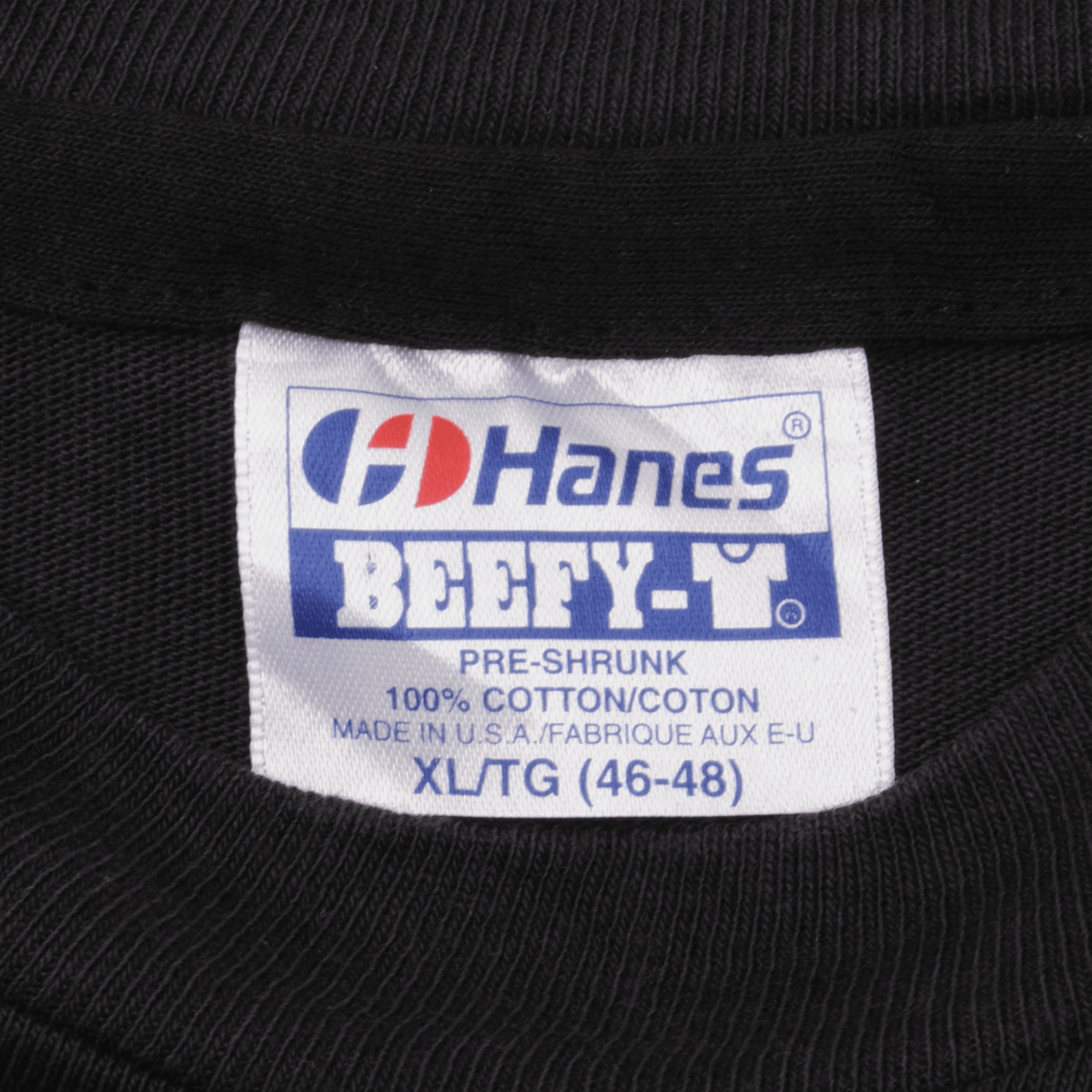 Hanes Beefy-T neck tag marked XL, pre-shrunk cotton and made in USA