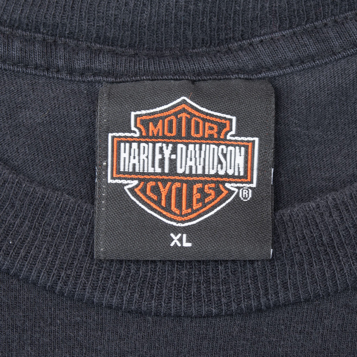 Harley-Davidson Motor Cycles neck tag marked XL on black T-shirt
