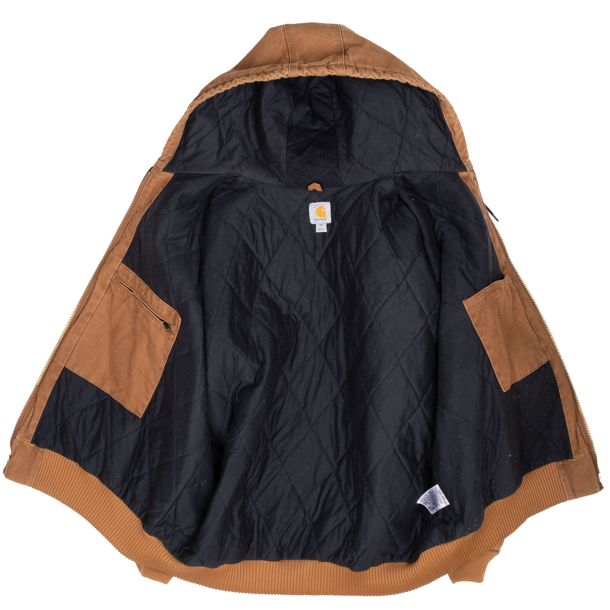 Open brown Carhartt active jacket showing black quilted lining and interior pockets