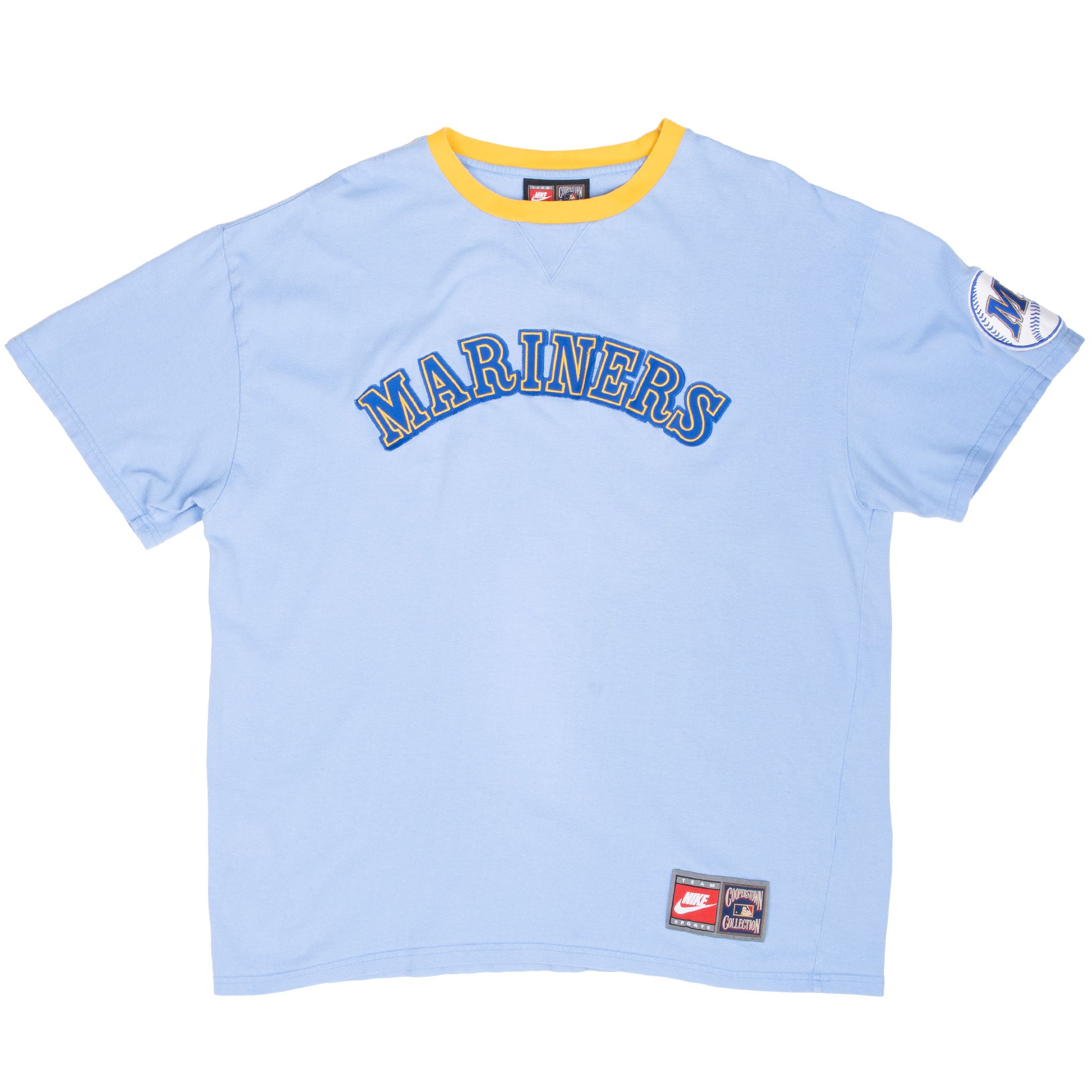 Full front of light blue Seattle Mariners Nike T-shirt with yellow collar, sleeve patch, and hem label
