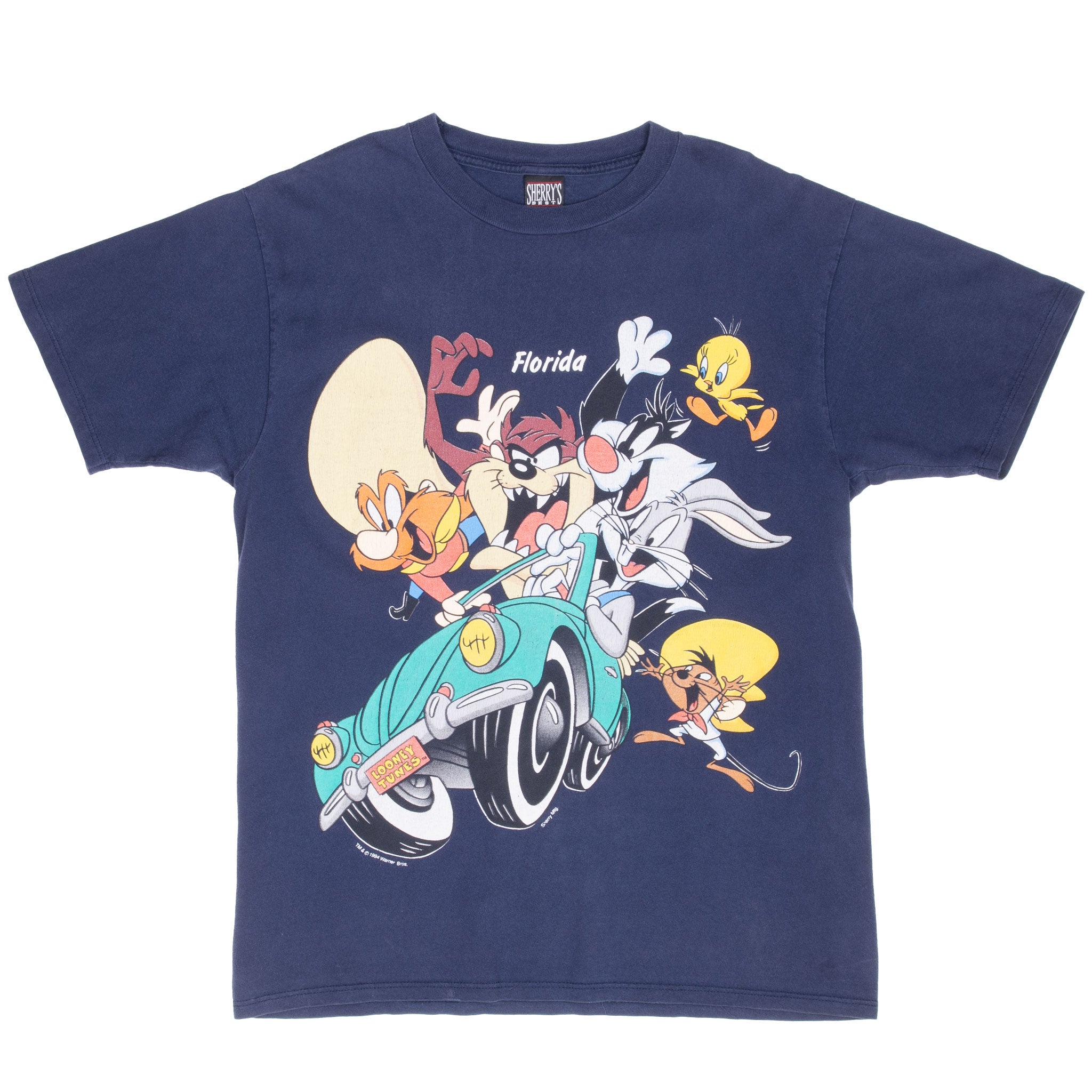 Front of navy Looney Tunes Florida tee with characters riding in a turquoise car