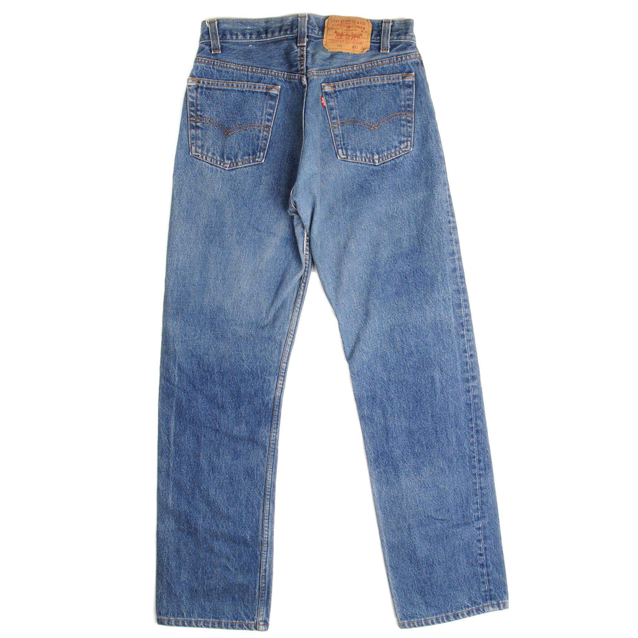 Beautiful Indigo Levis 501 Jeans 1985-1988 Made in USA with a medium blue wash and a nice contrast of light and medium blue. Size 28x29 Back Button #552