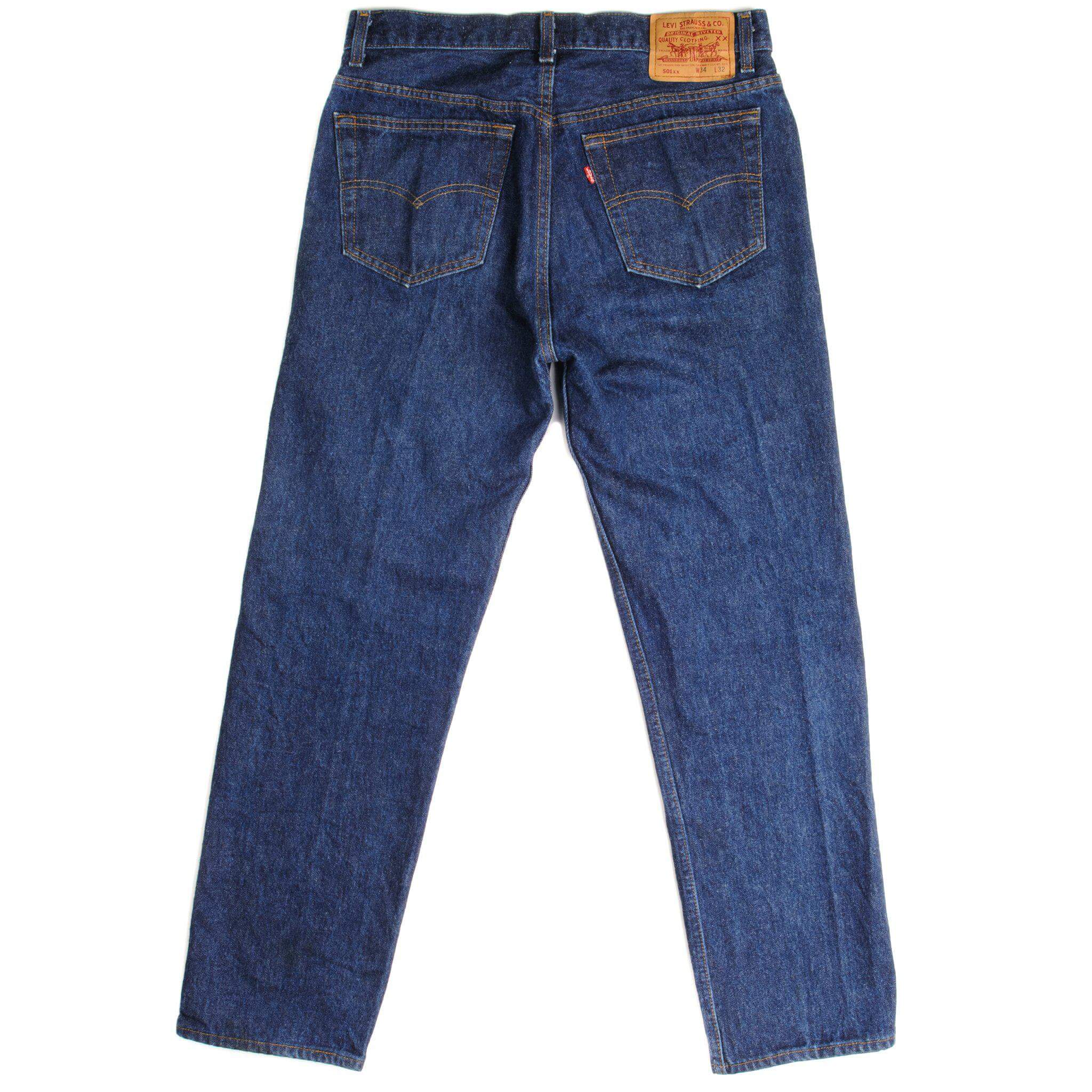 Beautiful Indigo Levis 501 Jeans 1988-1993 Made in USA with a dark blue wash. Size 31x29 Back Button #546