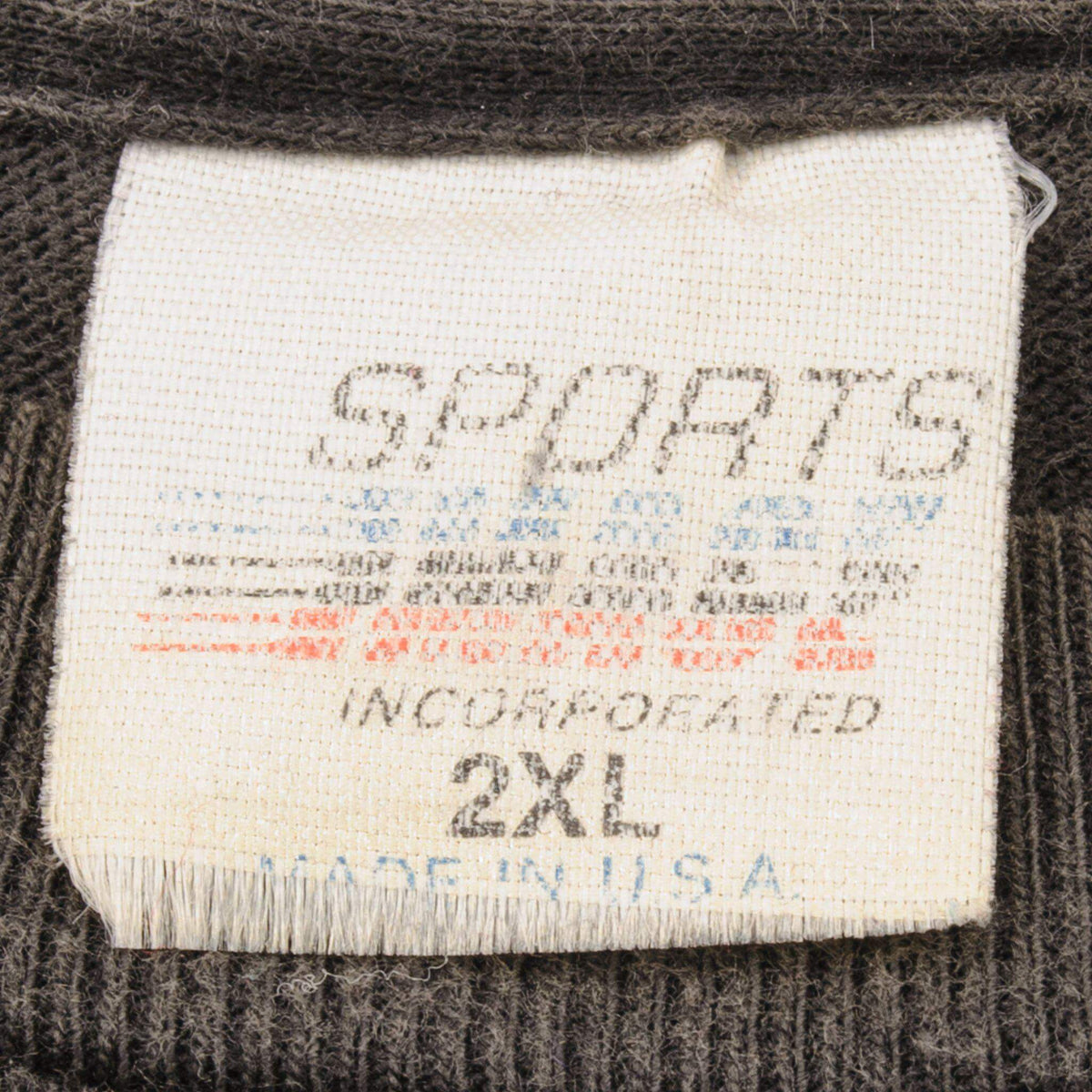 Close-up of Sports MFG 2XL neck tag on Dale Earnhardt T-shirt