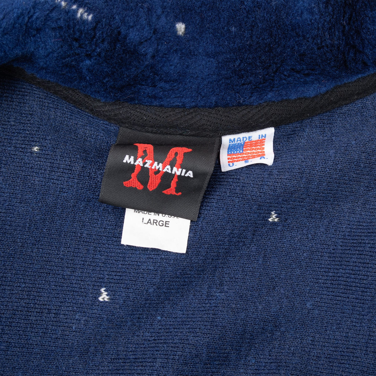 Mazmania neck label, Large size tag and Made in USA label inside navy fleece jacket
