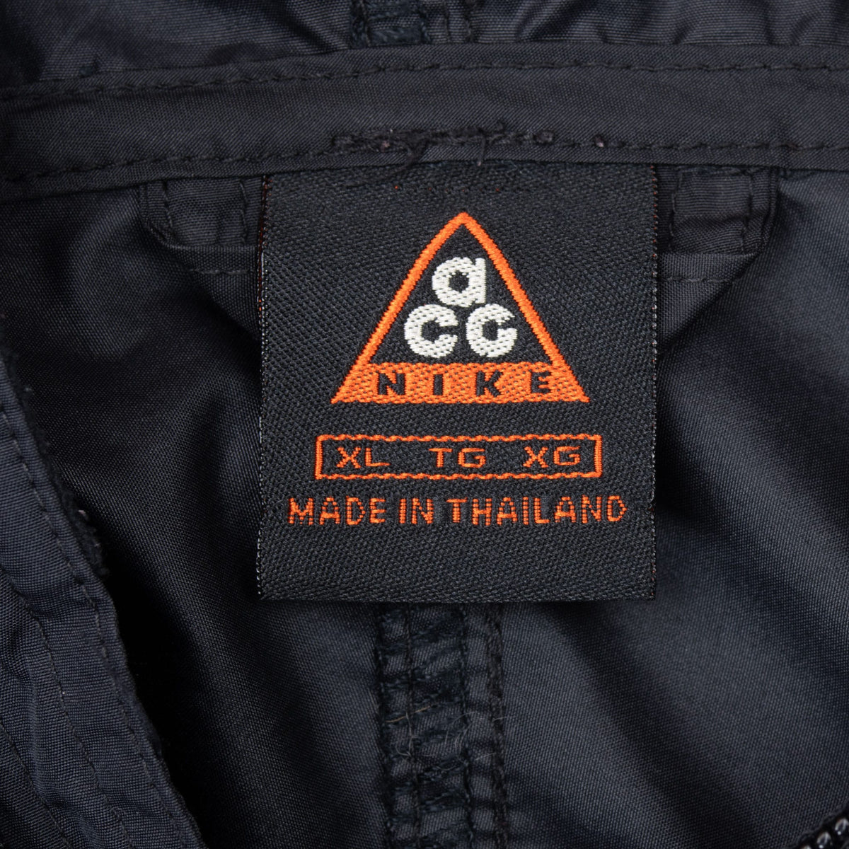Nike ACG neck label marked XL and made in Thailand