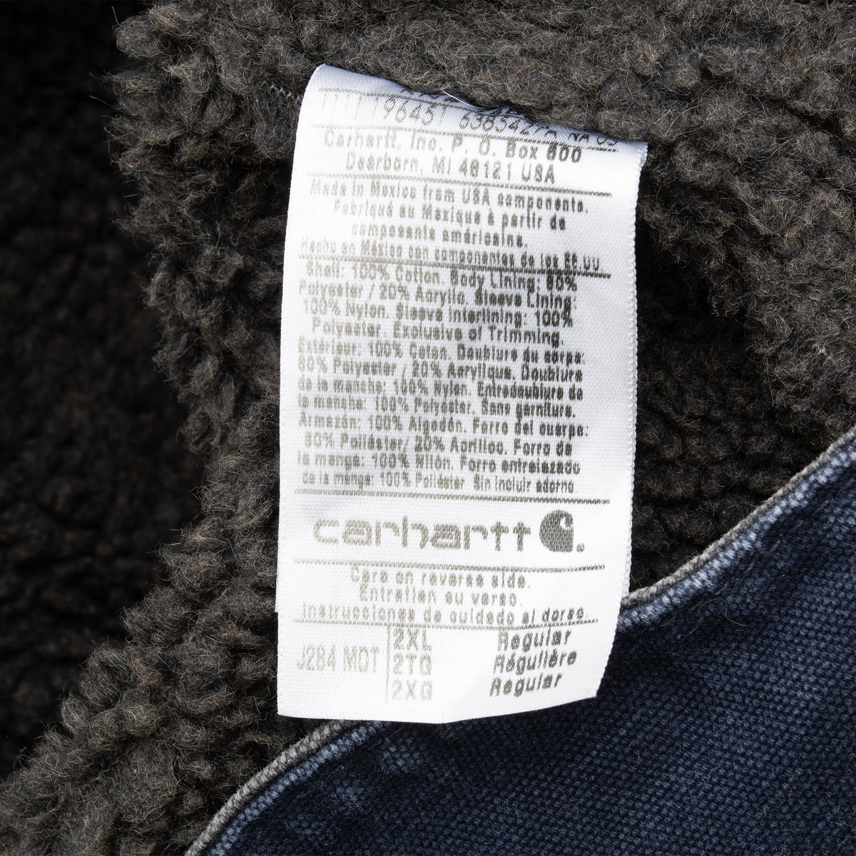 Care and model label inside Carhartt J284 MDT sherpa-lined jacket