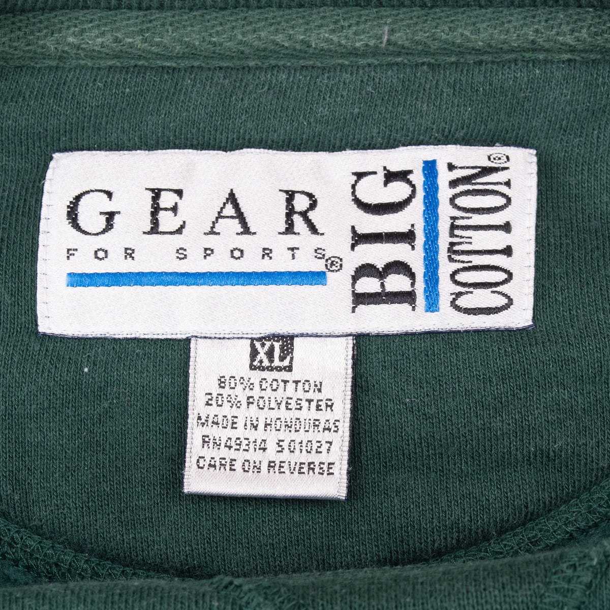 Gear for Sports Big Cotton neck label and XL fabric care tag inside the green sweatshirt