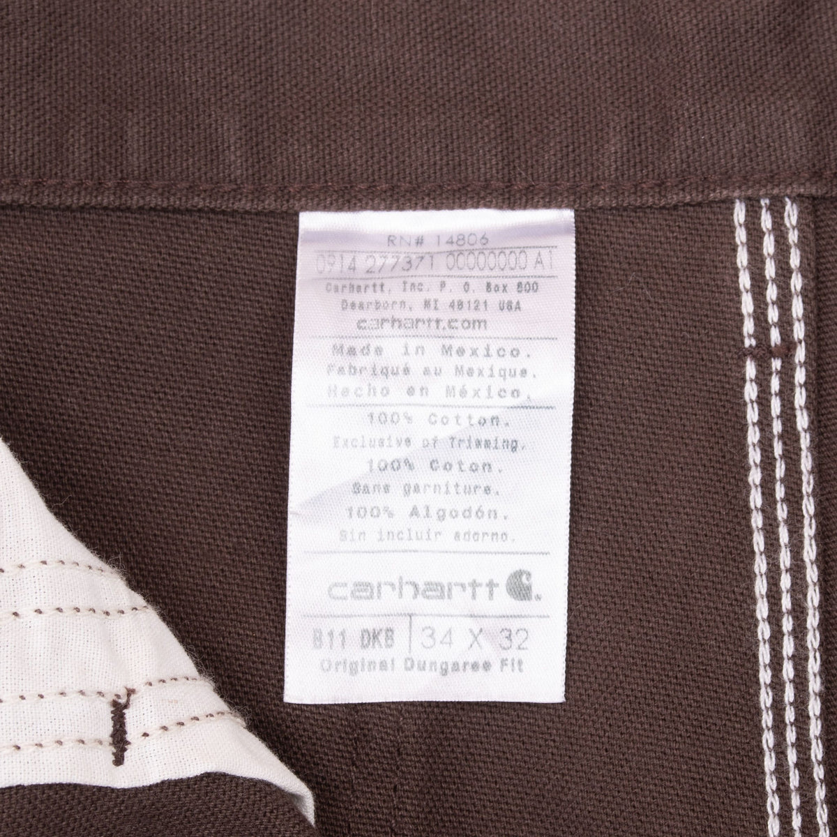 Interior Carhartt B11 DKB care label showing tagged size 34 x 32
