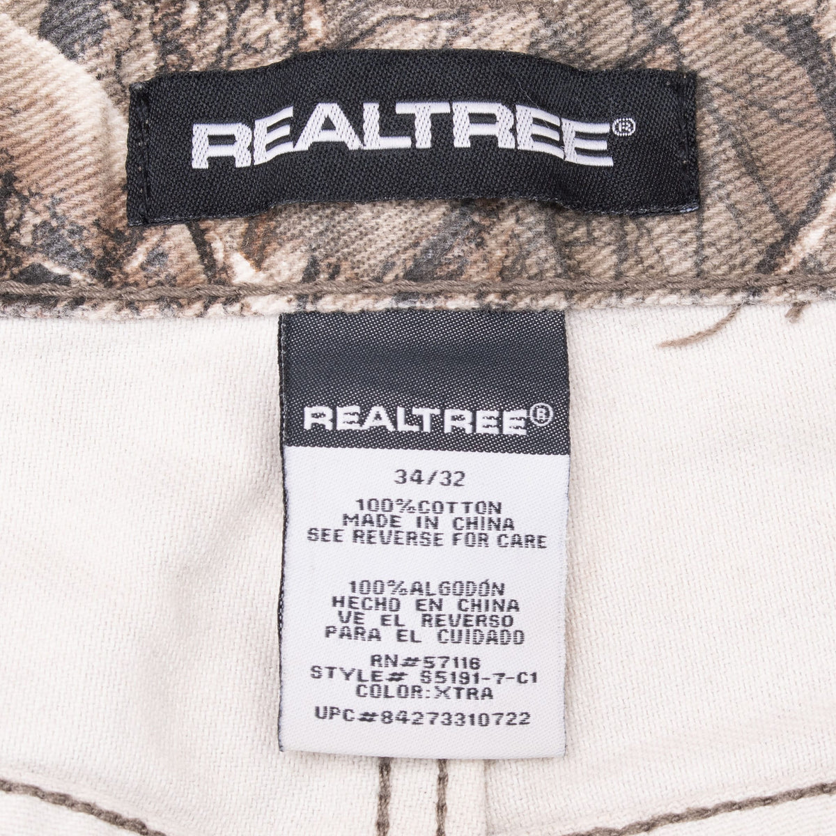 Realtree waistband and care labels showing size 34/32 and cotton content