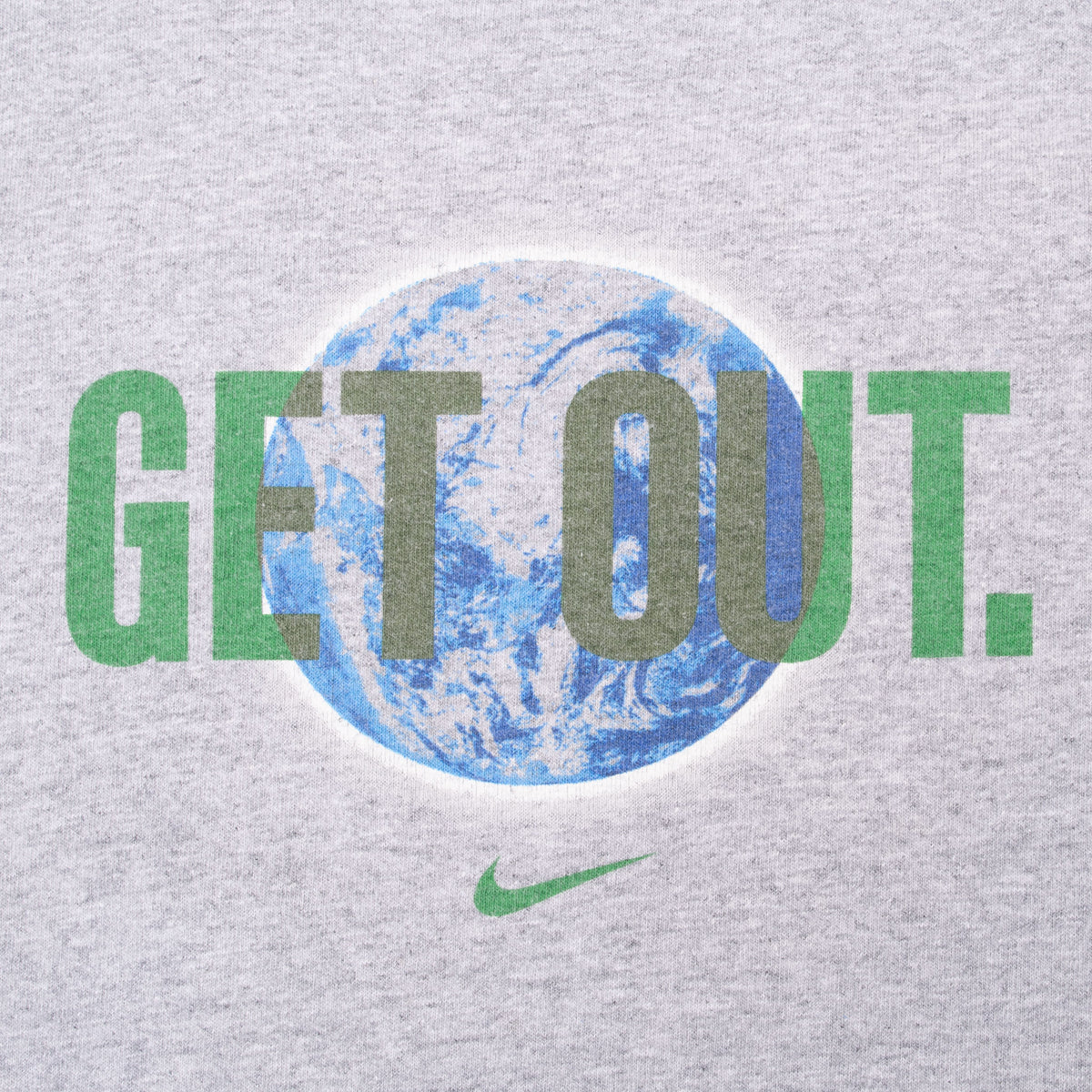 Close-up of blue Earth graphic with green and dark grey “GET OUT.” lettering and green Nike Swoosh