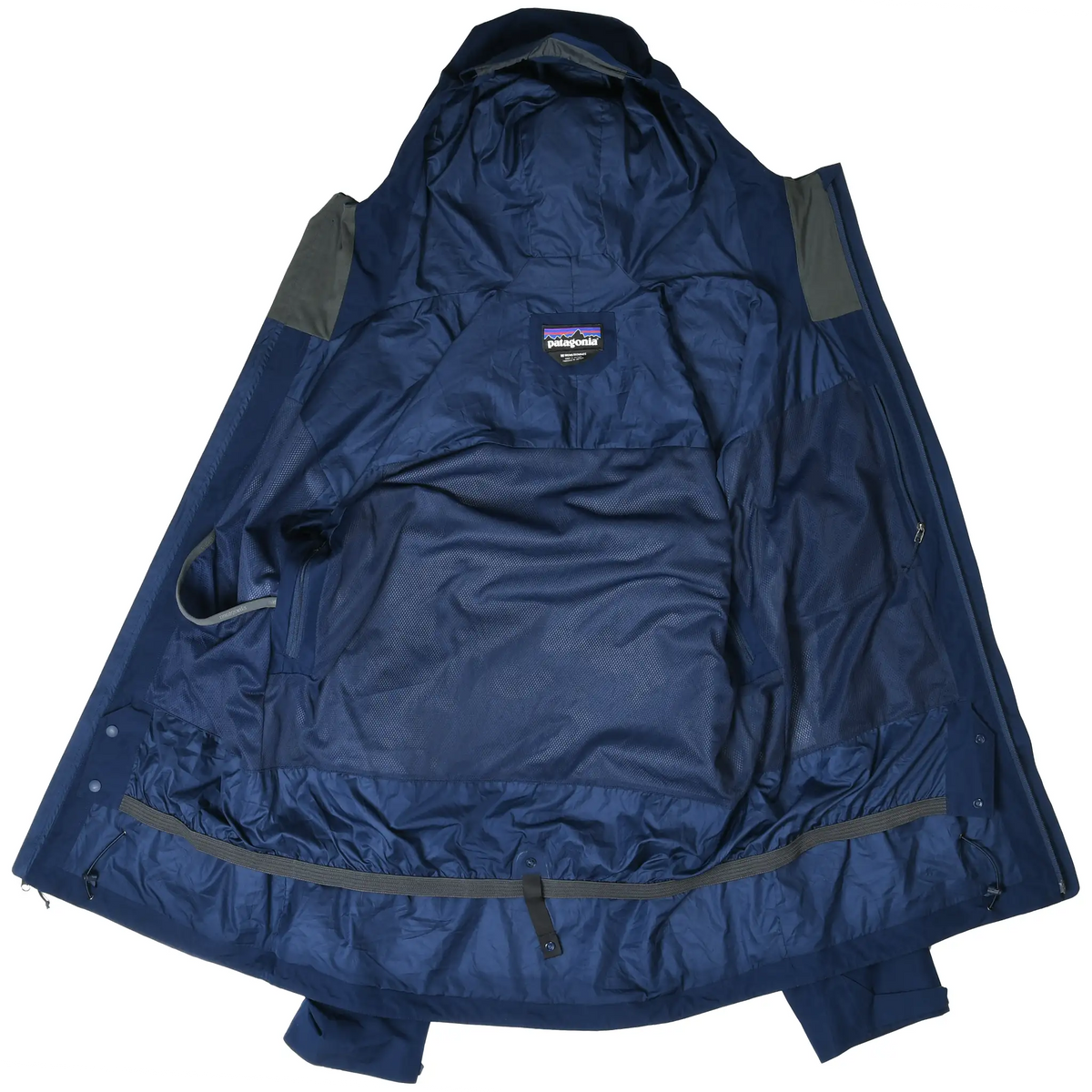 Open Patagonia Departer jacket showing navy blue interior and mesh panel