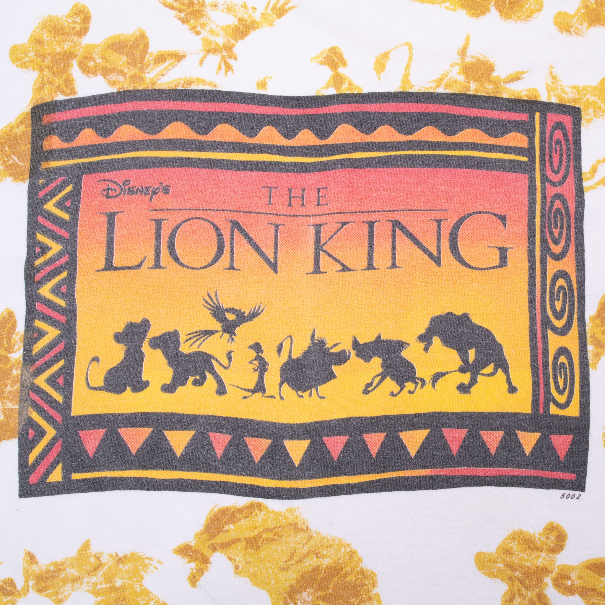 Close-up of colorful Disney The Lion King logo and character silhouette graphic