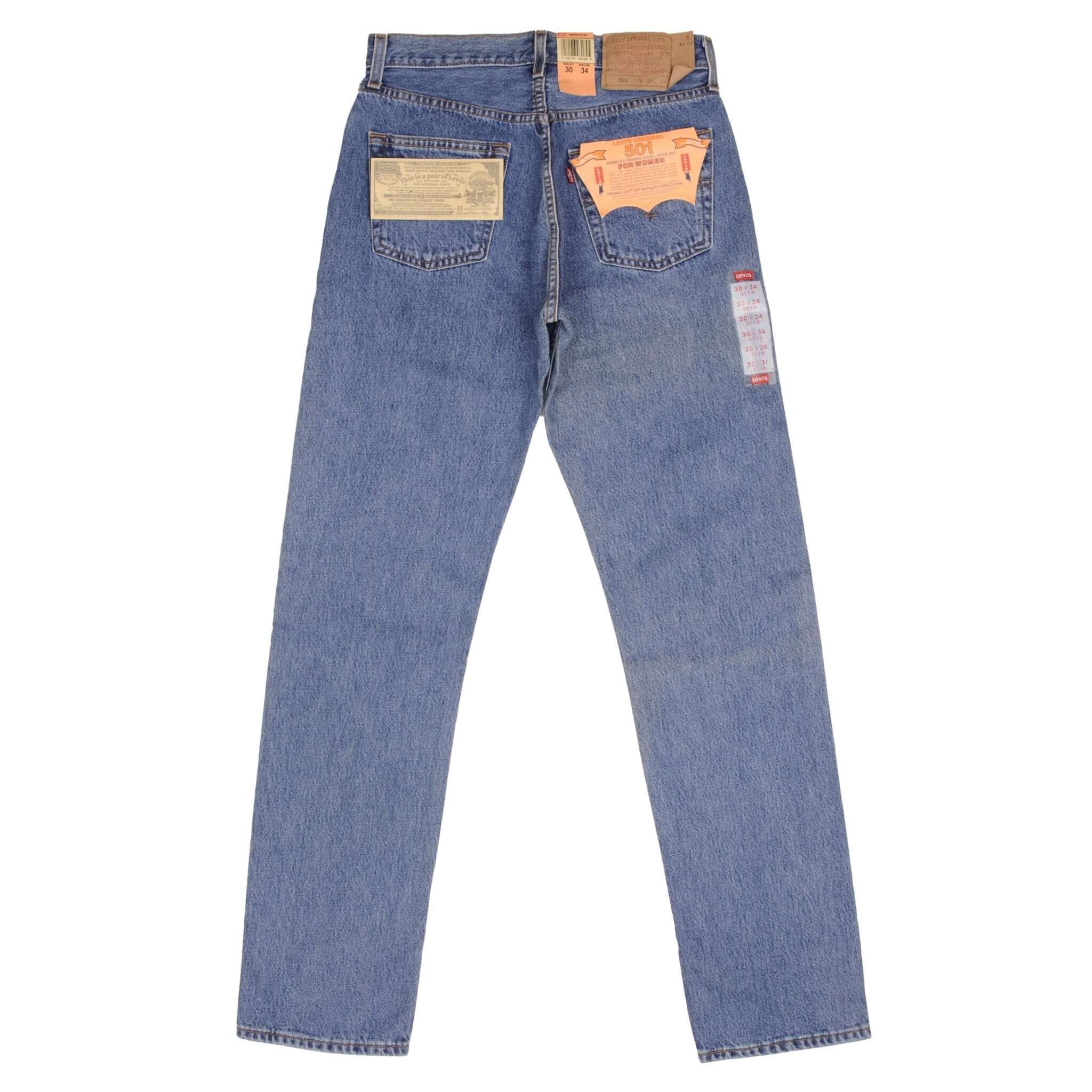 Beautiful Indigo Levis 501 Woman Jeans 1993 with Medium Wash Preshrunk Deadstock  Size on tag 30X34 Actual Size 30X33  Back Button #190