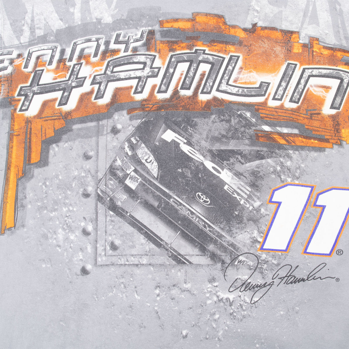 Front graphic detail with Denny Hamlin lettering, race car, number 11, and signature